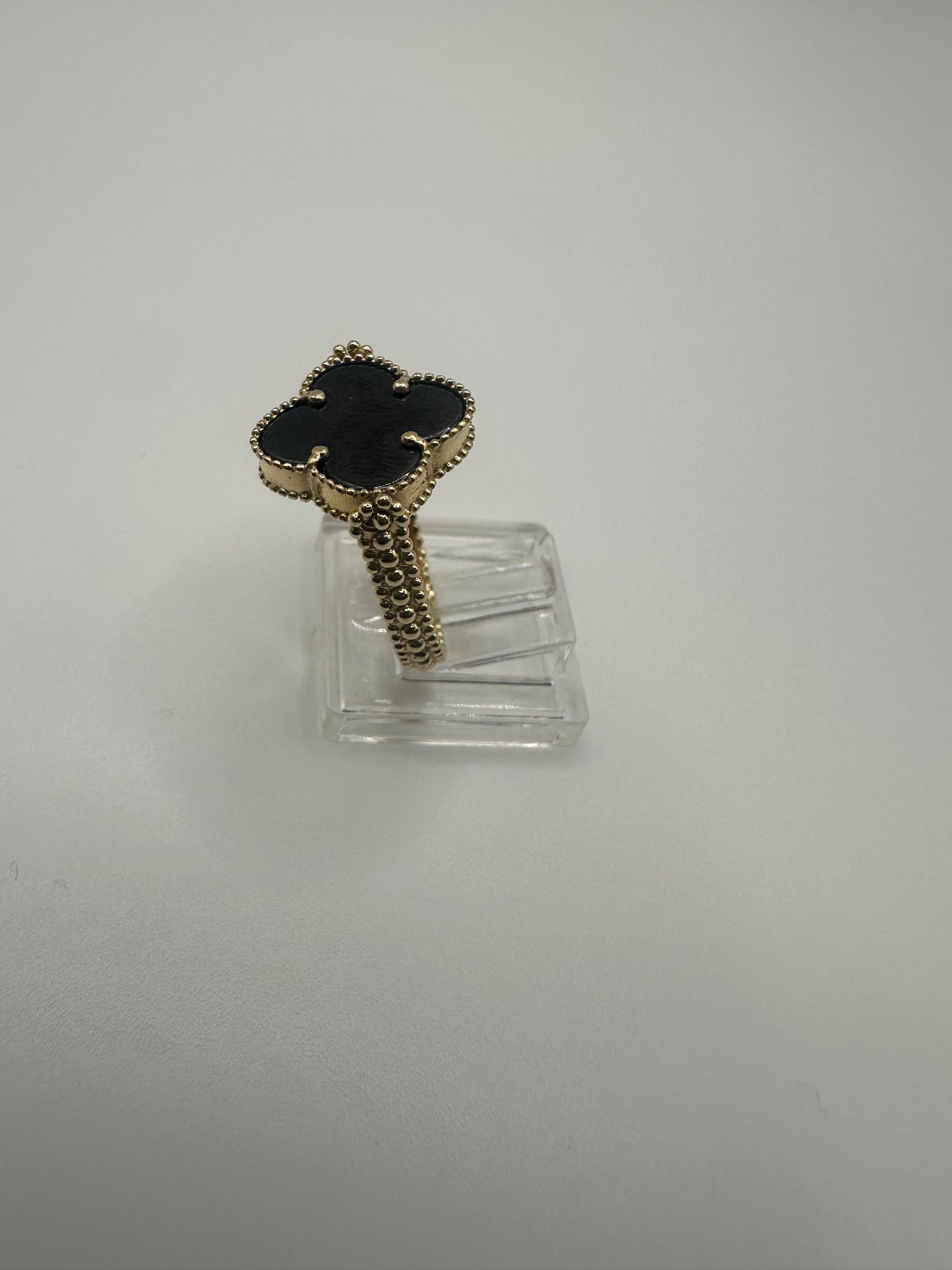 Anillo clover negra y color oro reversible