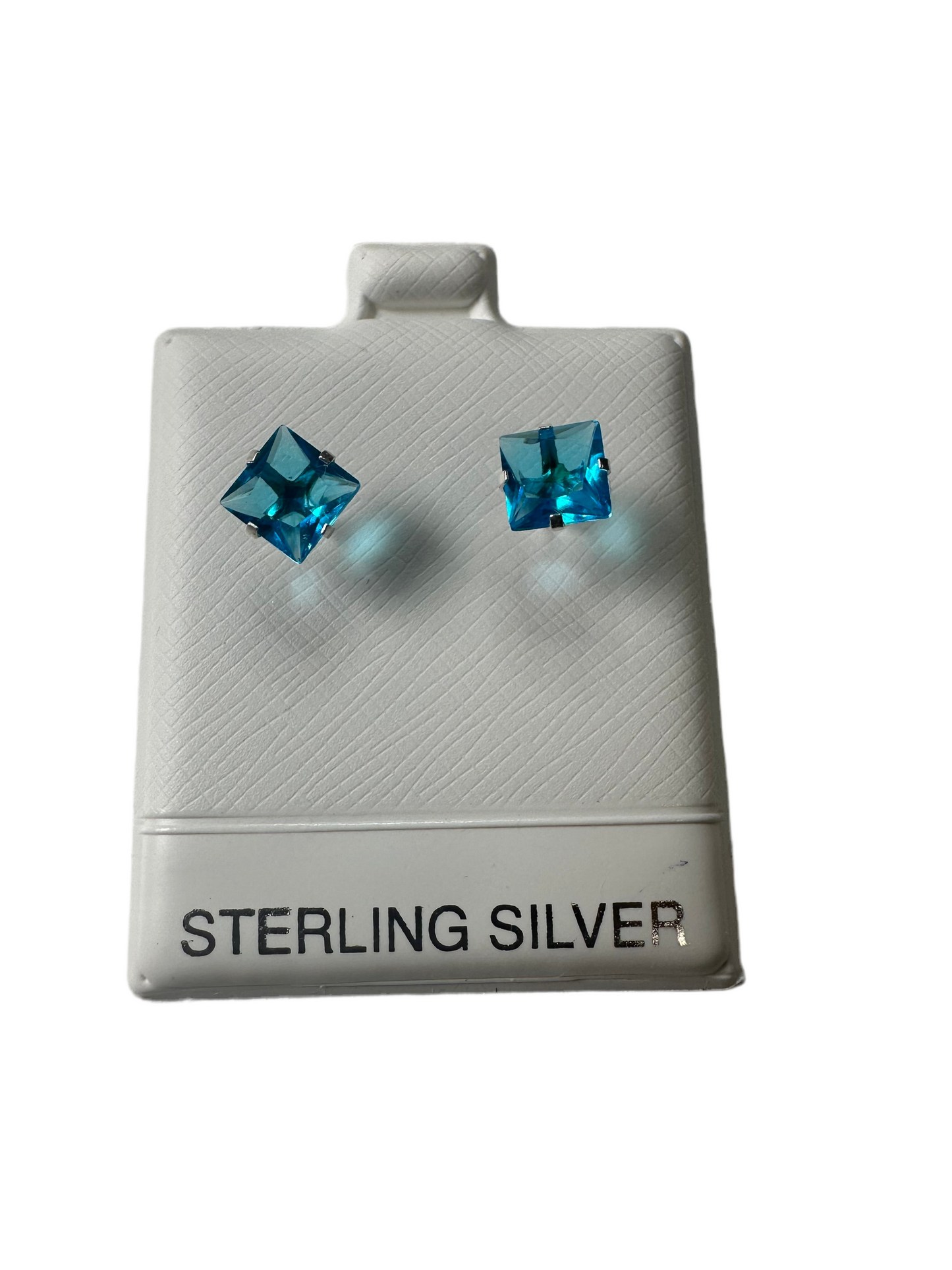 Aretes de sirconia azul con broche de bolita